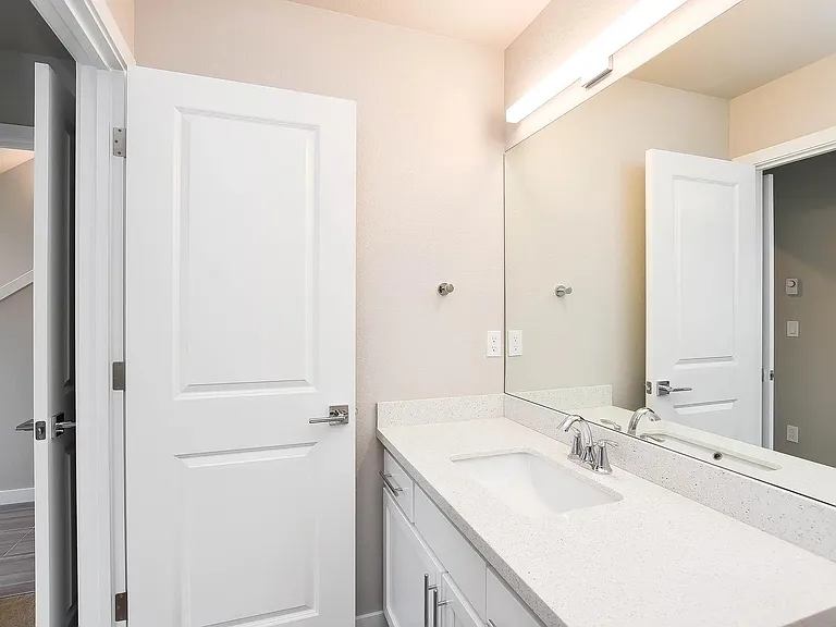 Each bedroom has attached full bathroom. Lower floor bathroom.