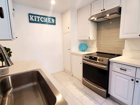 Electric Stove & Newly installed sink