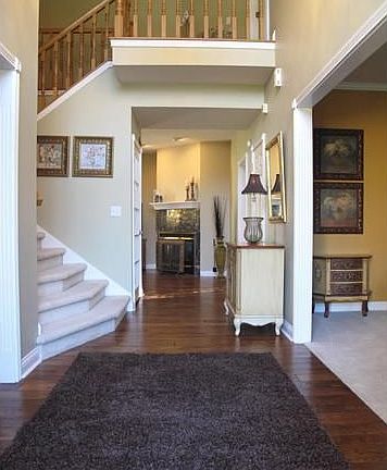 Entry: 2-Story Entry w/gleaming new Hand scraped Hardwood Floors.