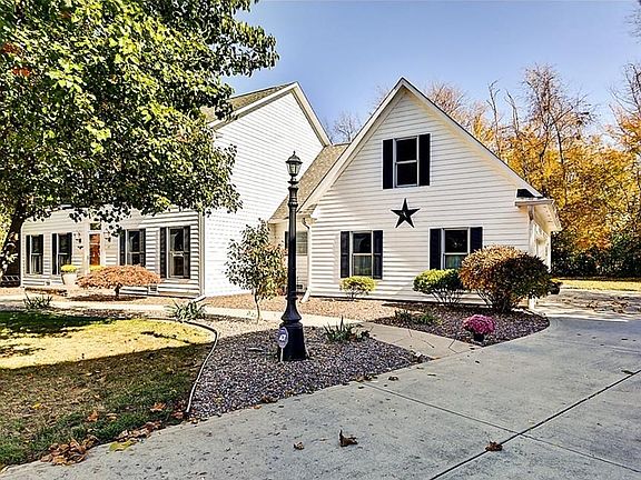 Exterior Front w/ Stamped Concrete Walk & New Stone 2015