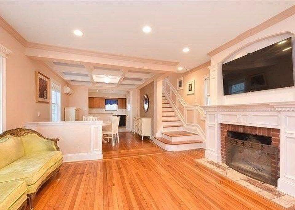Spacious living room with a warming fireplace!