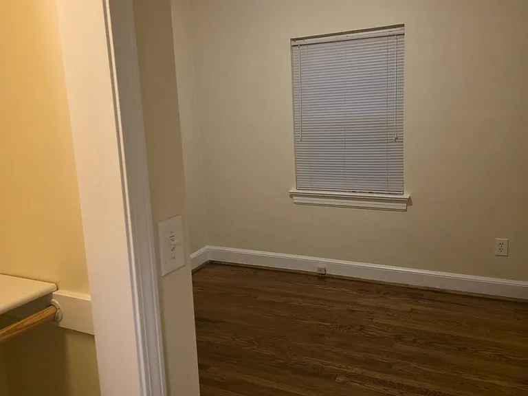 1st bedroom with double shelved lighted closet