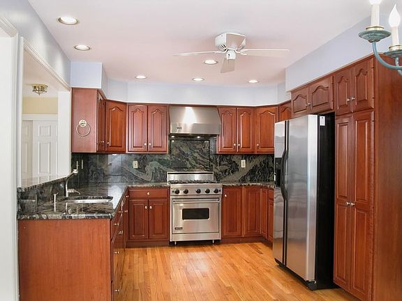 Stunning Kitchen with Viking Stove, granite and stainless steel appliances