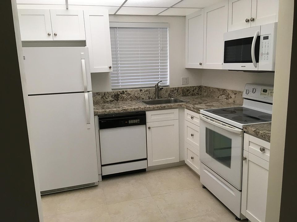 Kitchen area thru the archway