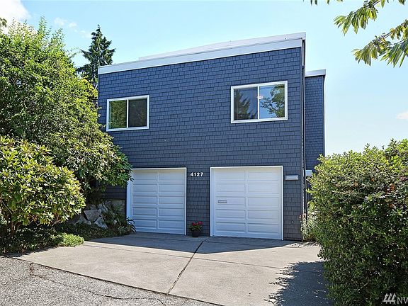 Puget Sound and Olympic Mountains views from this Contemporary home in West Seattle.