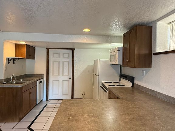 Spacious kitchen with bar seating