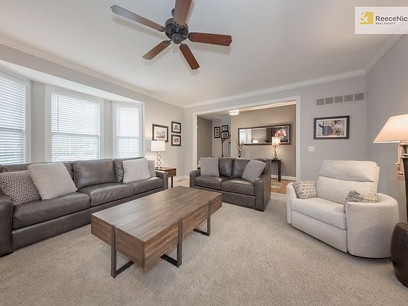 Large great room with newly updated fireplace.