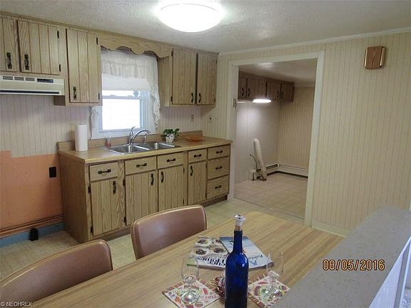 Dishes are always easier to do with a nice view! Kitchen is easily accessible from the garage.