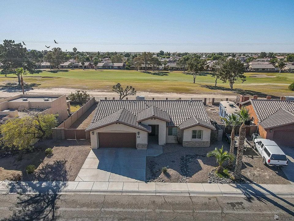 over view of house onto golf course