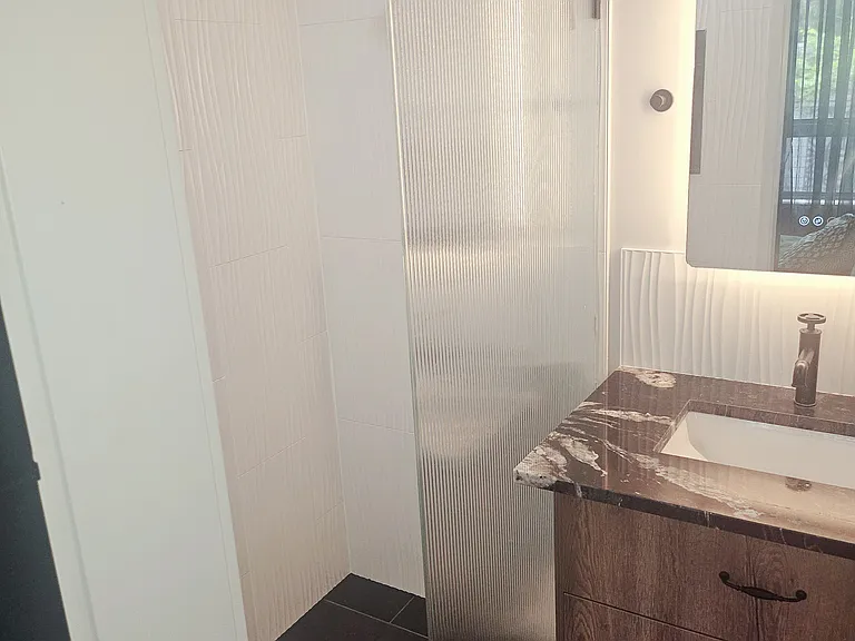 Spacious shower with rainfall showerhead