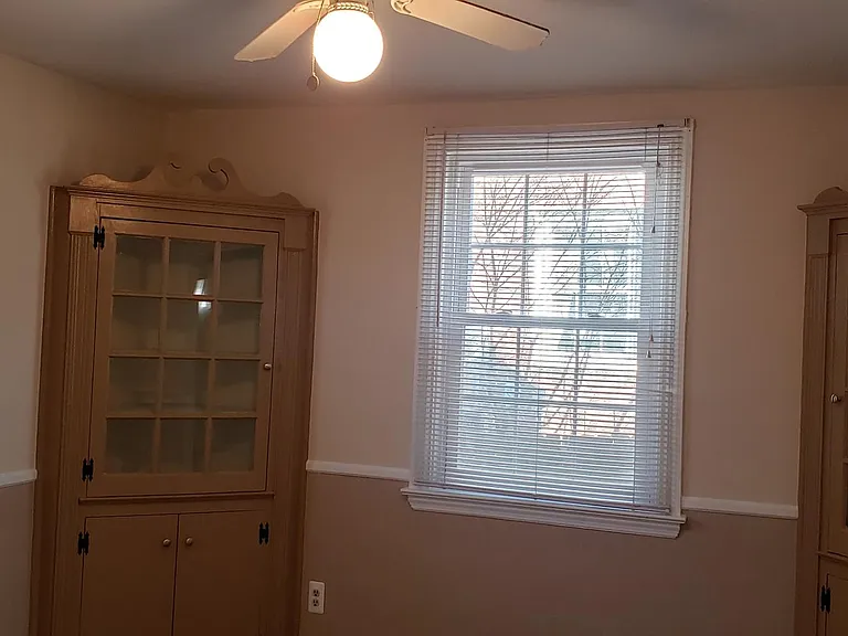 Dining Room with built in corner cabinets
