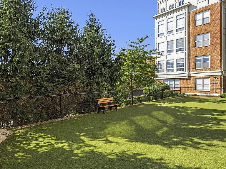 Experience serene living with this picturesque garden space, perfect for relaxation.