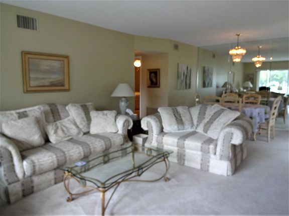 Living room from entry, formal dining room