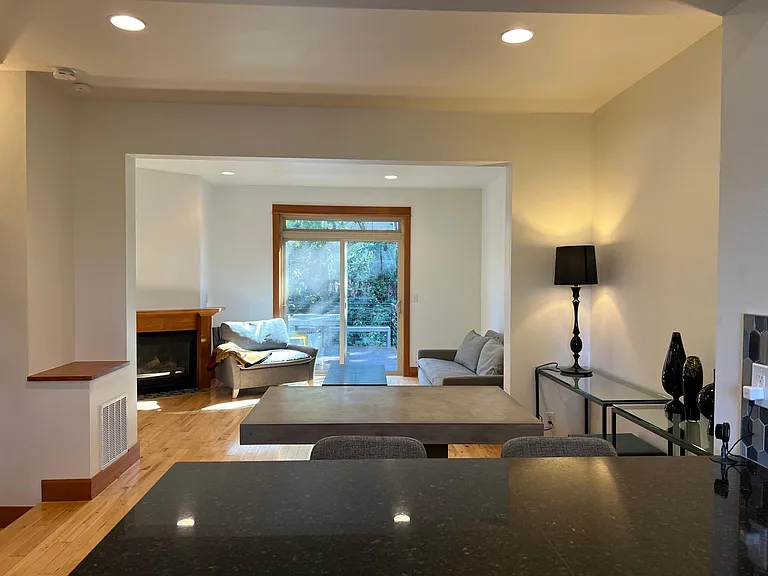 view toward living room and dining area from kitchen