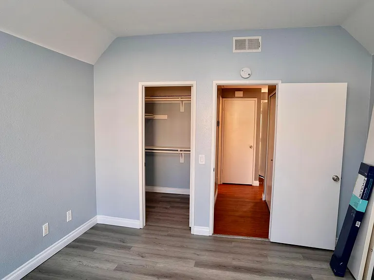 Bedroom with walk-in closet