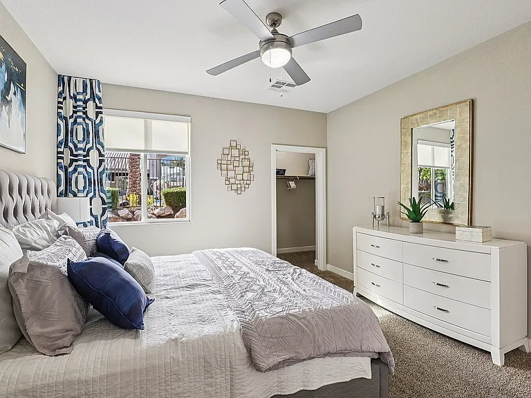 Bedroom with Ceiling Fam and Walk In Closet