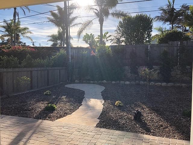 Back yard patio. Fully fenced for Fido. Dry-scape plantings, low water usage. Enjoy the cool breeze that comes off the mesa at 4pm!