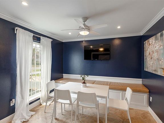 The formal living and dining areas offer flexible space to be used however you need...