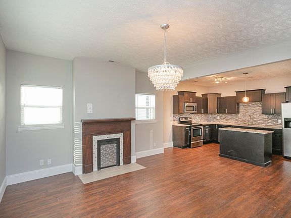 Mantle and large kitchen