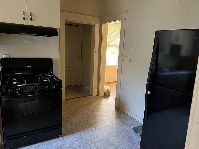 kitchen doorways leading to dining area and laundry/utility room