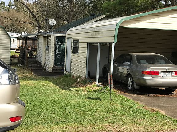 Storage & cement carport 
