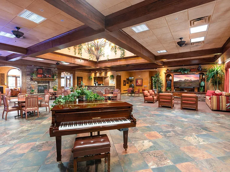 Centered around an elegant 6,000 sq. ft. Clubhouse, Carefree Senior Living Apartments offer many amenities including an onsite salon, billiards and game room, a fully equipped fitness center, business center and library, player grand piano, onsite ATM, st