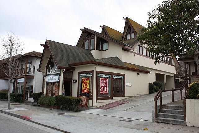 Front of Property. Commercial unit in front. Apartments in back.