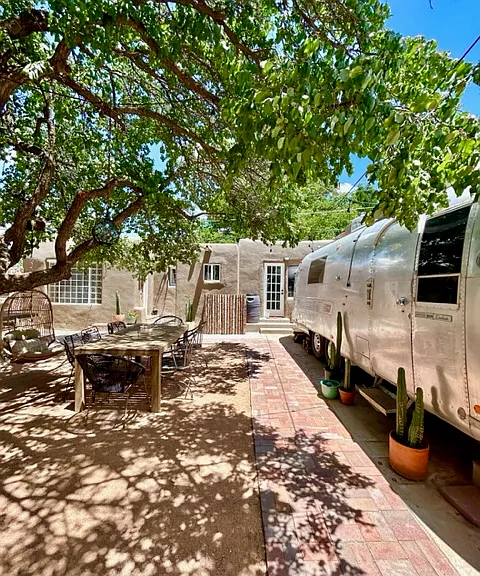 Brick walkway to the casita through the shared courtyard with the main house.