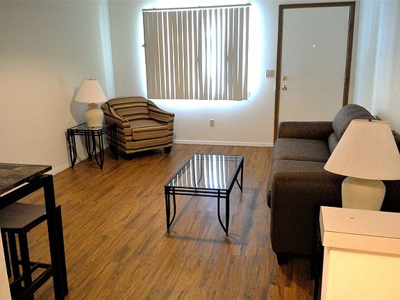 Living room with wood like flooring