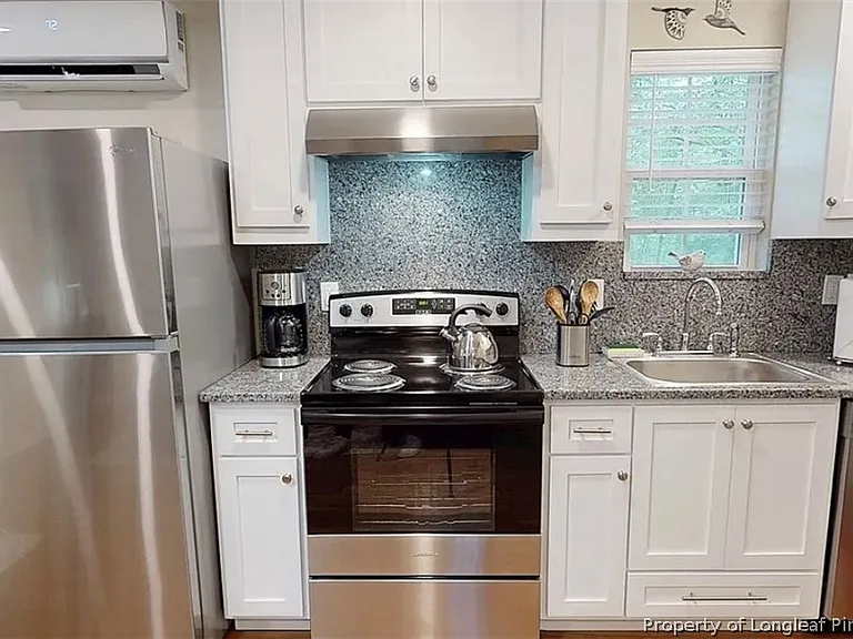 2402 Rockwood Cottage Dr — Photo 5