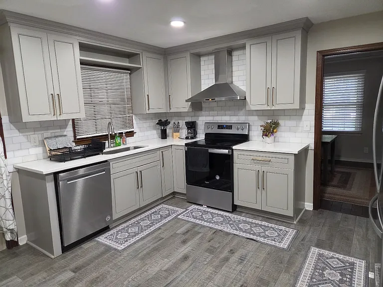 Kitchen with Range,Dishwasher and Vent