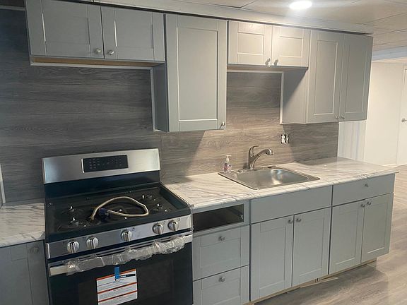 Fully renovated kitchen with brand new appliances.