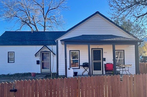 Relax on the porch. Room to garden in the (rental is side with front porch)
