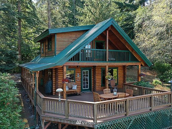 Over 700 sq.ft. of new Trex decking provides the perfect platform to take in all the beauty that surrounds you. Propane hook up is ready for your gas grill and the party. Decking wraps around the east side of the home. 