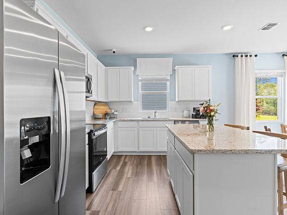 Stainless Steel Appliances. Model Home Representation.