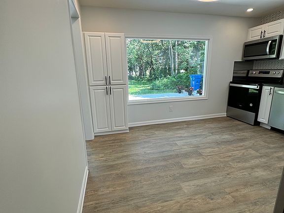 New Kitchen overlooking the backyard + pantry