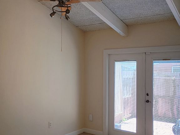 Master (which has new white paint) vaulted Ceilings and shelves for Decorating
