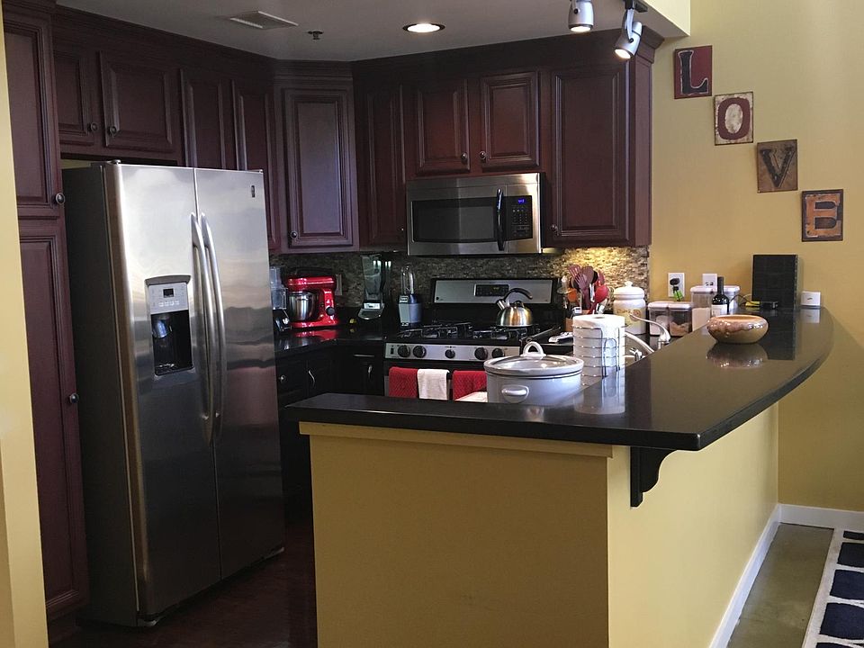 Kitchen boasts stainless steel appliances and lots of storage