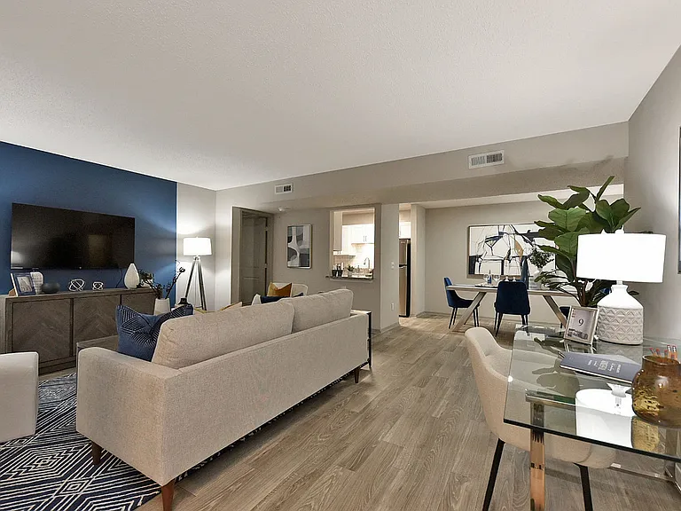 Spacious living room with hardwood-style flooring