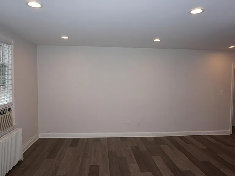 Back wall of front room.