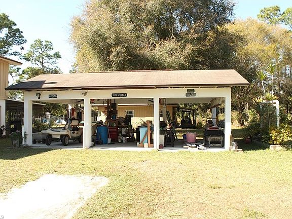 Concrete 3 car carport with water and electric