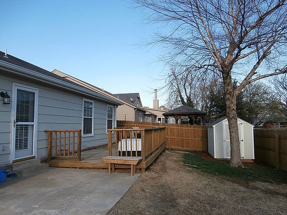 Deck off patio and shed