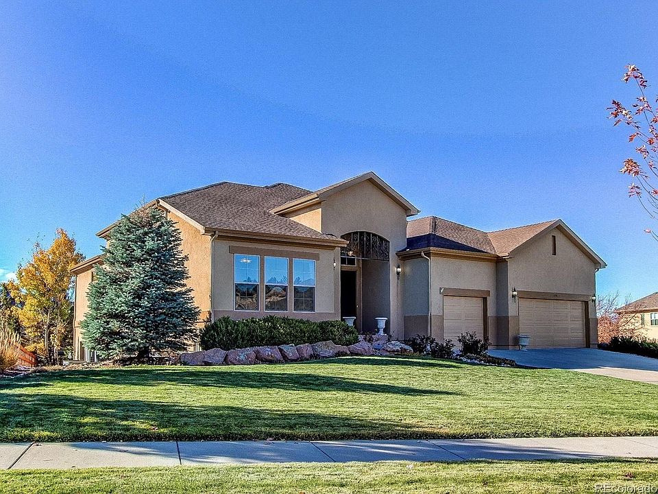 Street View from front. One level living on a hill with unfinished windowed basement for storage or exercise room