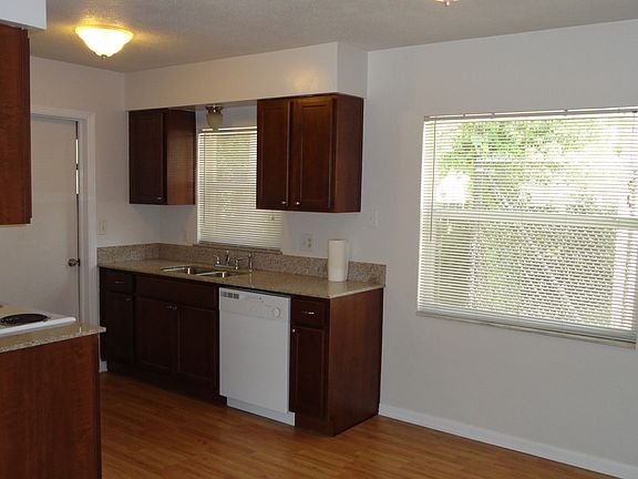Granite counters, wood cabinets