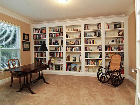 The Study comes complete with built-ins and beautiful French doors