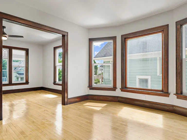 Dining room top unit leading into front living space shot empty so you could imagine your own things here!