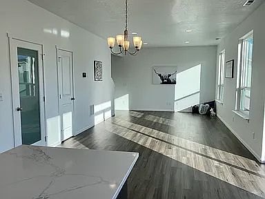 Open concept kitchen-dining-living room