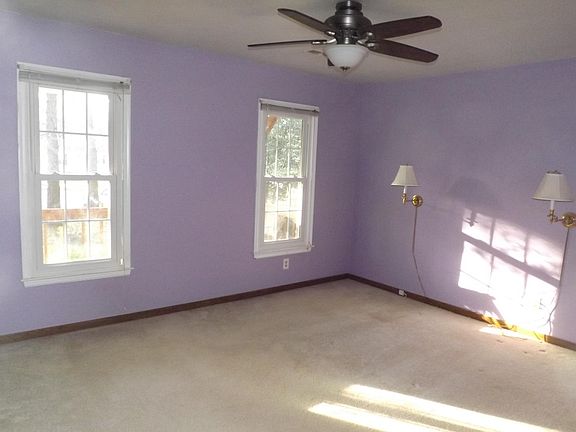 14x11'6": Downstairs front Bedroom With Built In Bedside Li