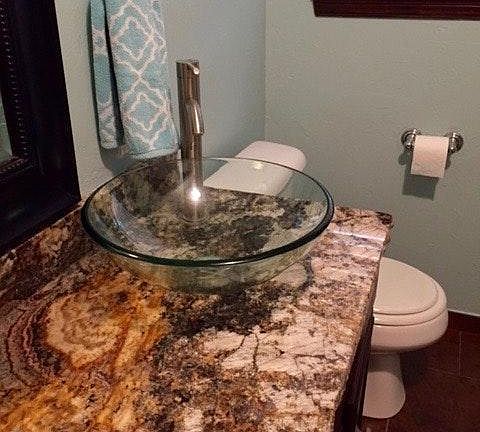 Hallway bath with granite counter