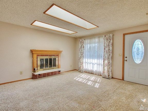 Family room with cozy gas fireplace. 